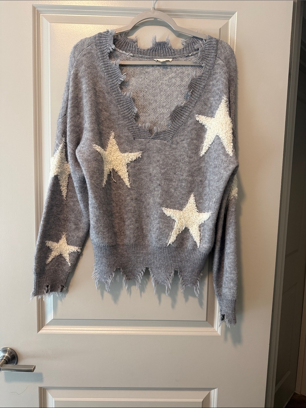 eesome Gray V-Neck Sweater with White Star Accents